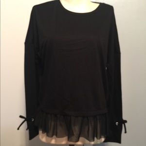 Black long sleeve with ties and a sheer ruffle